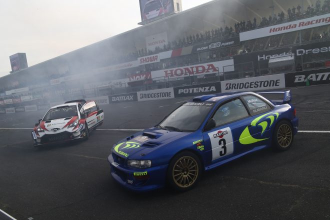 トミ・マキネン(ヤリスWRC)と新井敏弘(スバル・インプレッサWRC98)