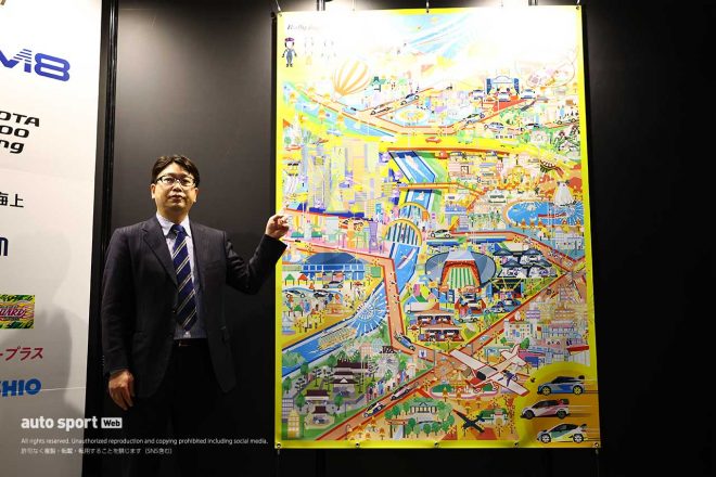 記者発表に登壇したラリージャパン実行委員会の鈴木賢志会長とフォーラムエイト・ラリージャパン2022のコンセプトビジュアル